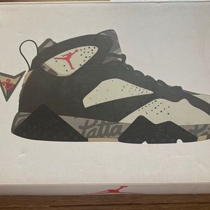 This is a Jordan patta it is green cream color they are stock ex verified